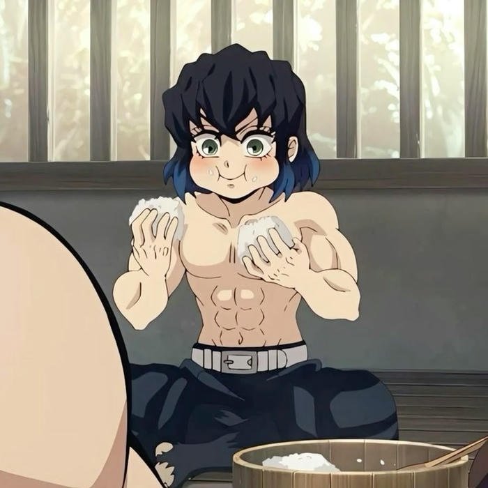 Hình Inosuke anime đang ngồi ăn