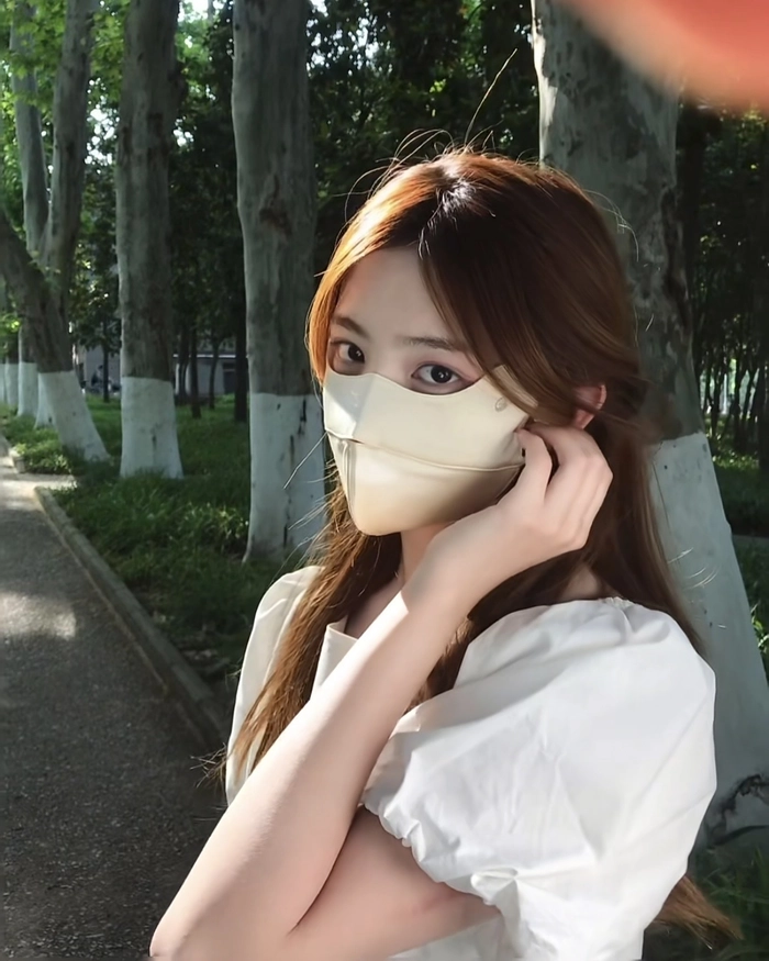Hình gái Trung Quốc che mặt cùng ánh nắng lung linh