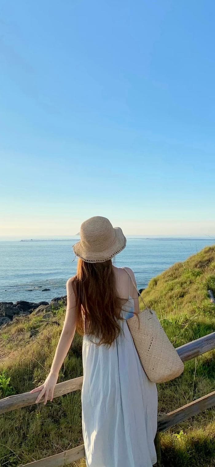 ảnh nền cô gái quay lưng nhìn xa xăm